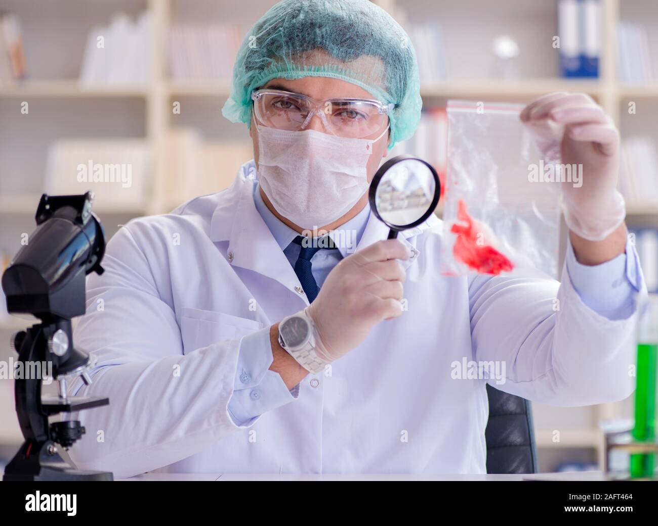 Lab Detectives The forensics investigator working in lab on crime evidence Stock Photo ...