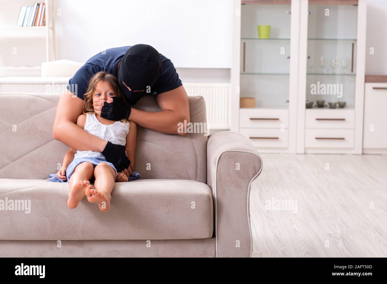 The child trafficking and abuse concept with small girl Stock Photo - Alamy