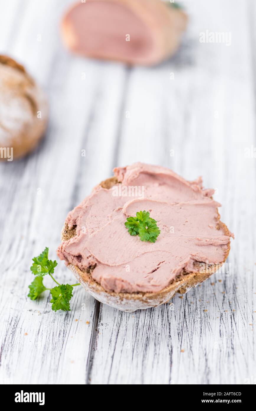 Liverwurst Sandwich on a vintage background as detailed closeup shot