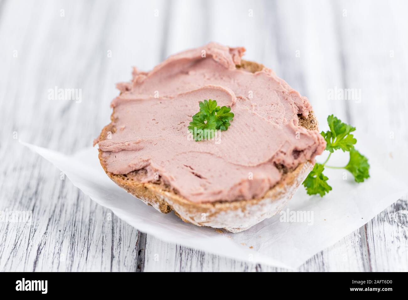 Fresh made Sandwich with Liverwurst on a vintage background (closeup