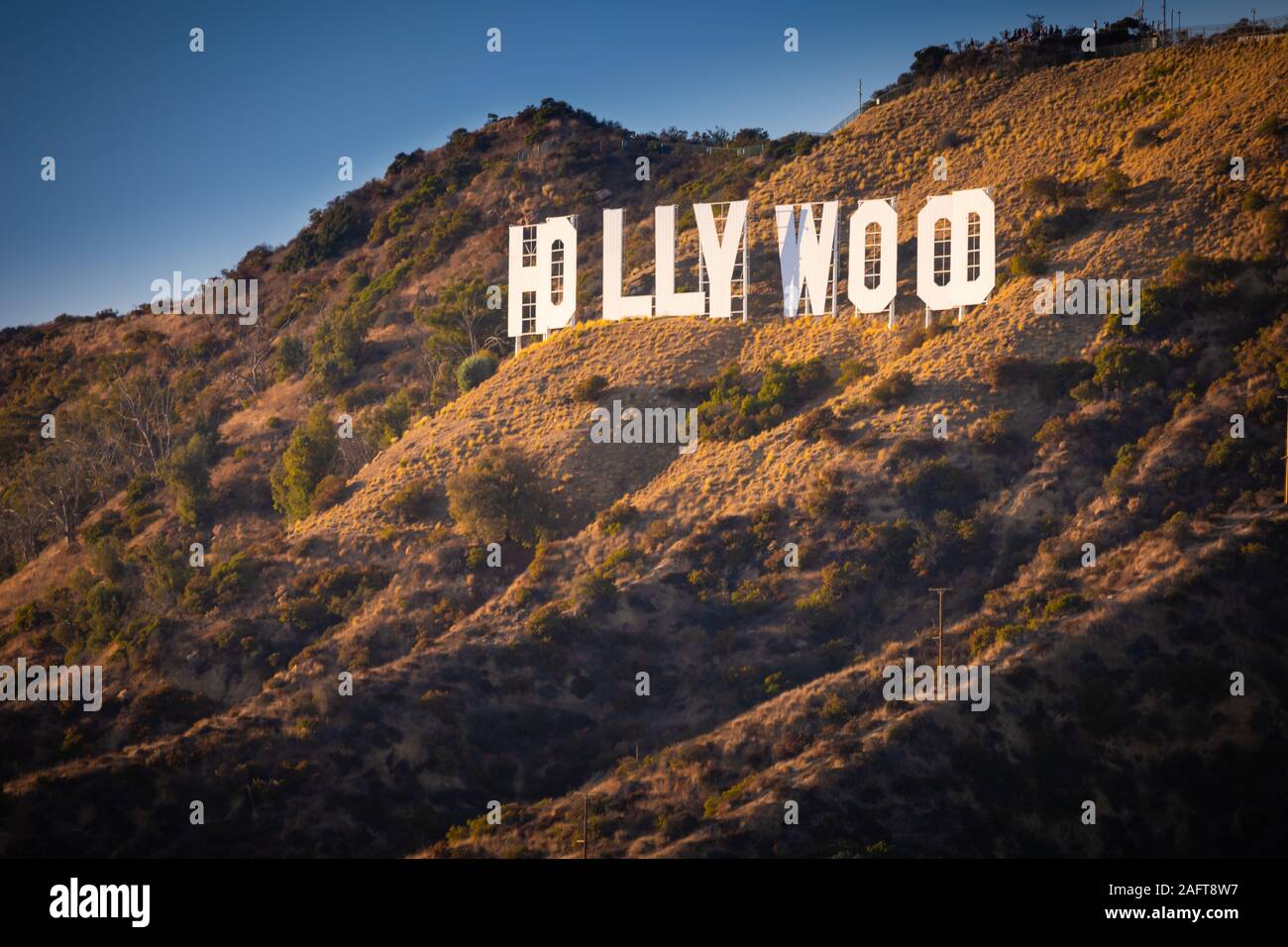 The Hollywood Sign (formerly the Hollywoodland Sign) is an American landmark and cultural icon overlooking Hollywood, Los Angeles, California. Stock Photo