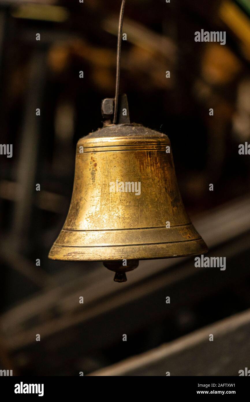 close up of brass work bell in Sir Richard Arkwright's cotton and textile mill at Masson Mills Museum Derbyshire UK Stock Photo