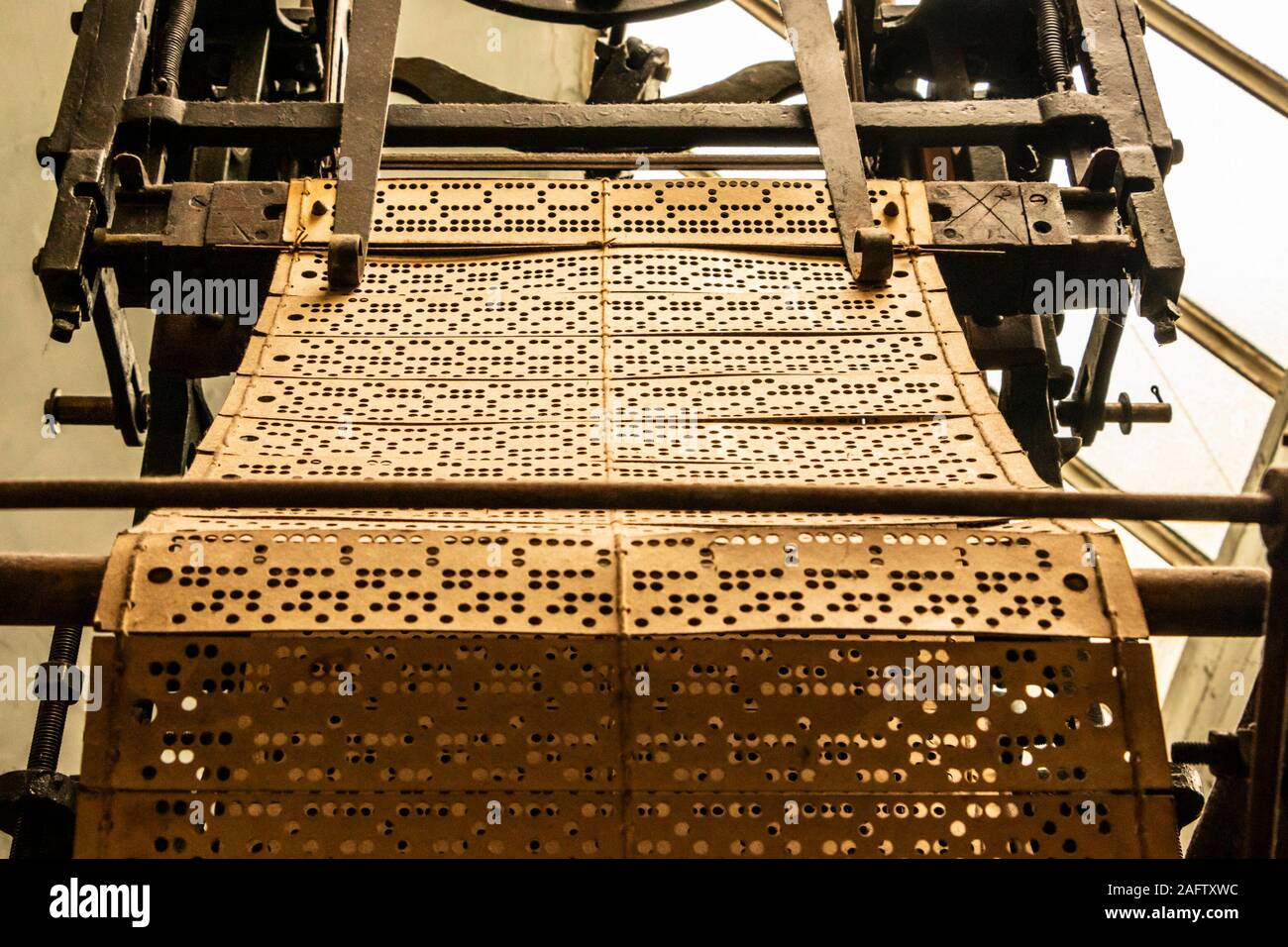 punched paper cards used for programming a jacquard loom in Sir Richard Arkwright's cotton and textile mill at Masson Mills Museum Derbyshire UK Stock Photo