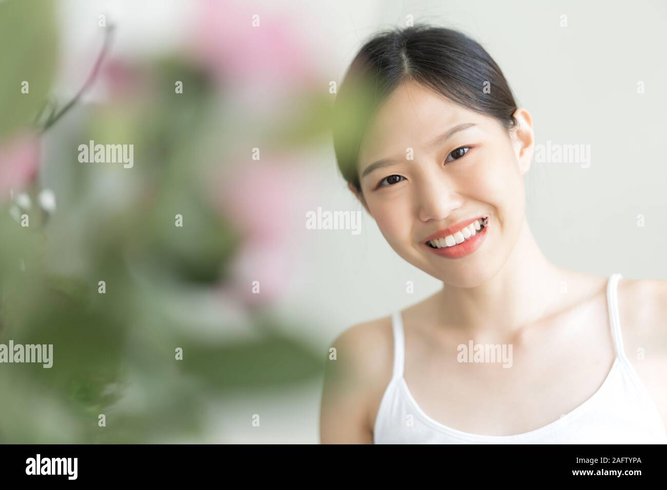 portrait young asian woman . The girl smiled at the camera. Stock Photo