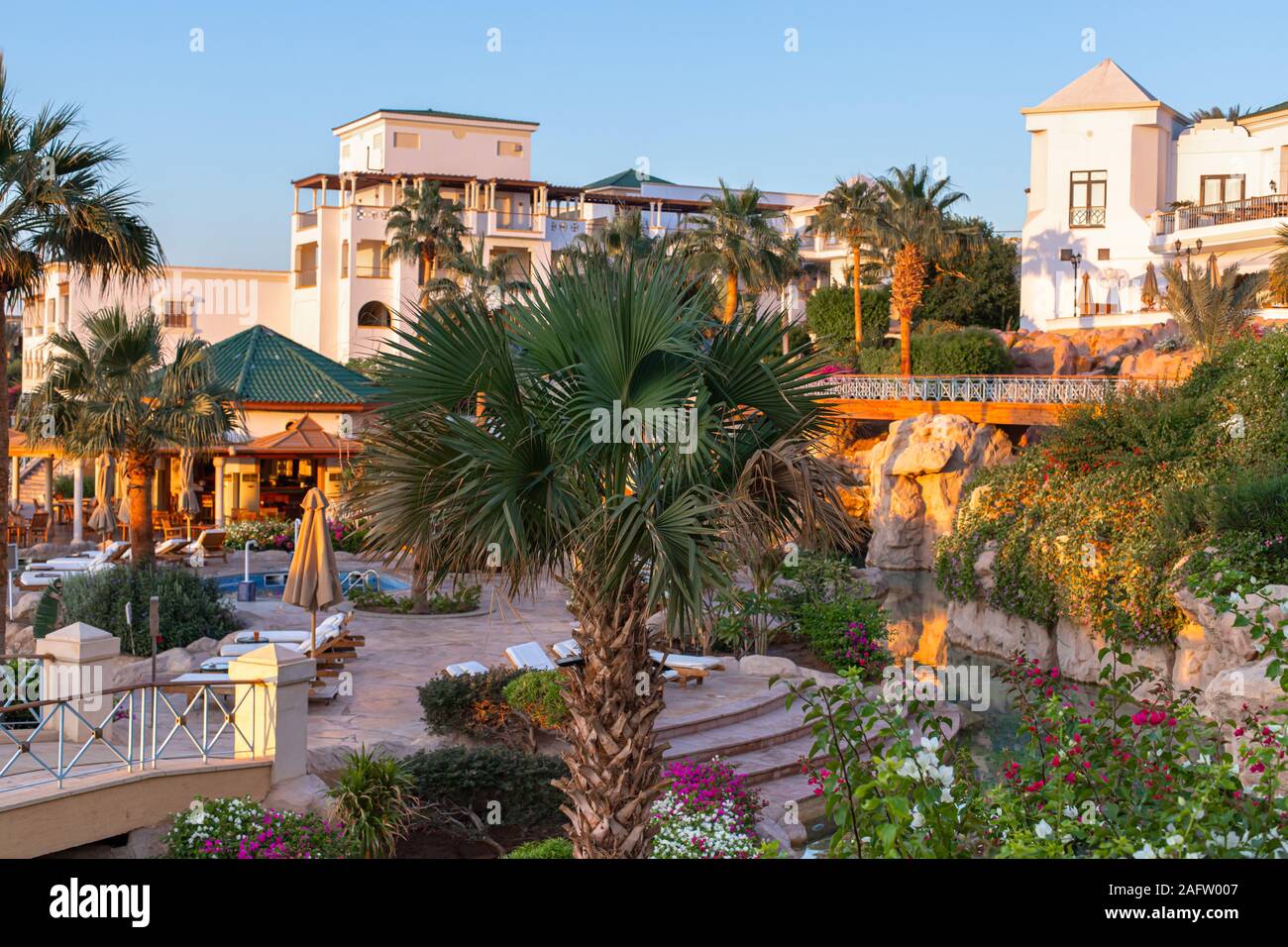 Sharm El Sheikh, Egypt - 11.03.2019: Hyatt Regency Sharm El Sheikh Resort. View of paradise vacation at tropical resort. Eastern architecture at dawn. Stock Photo