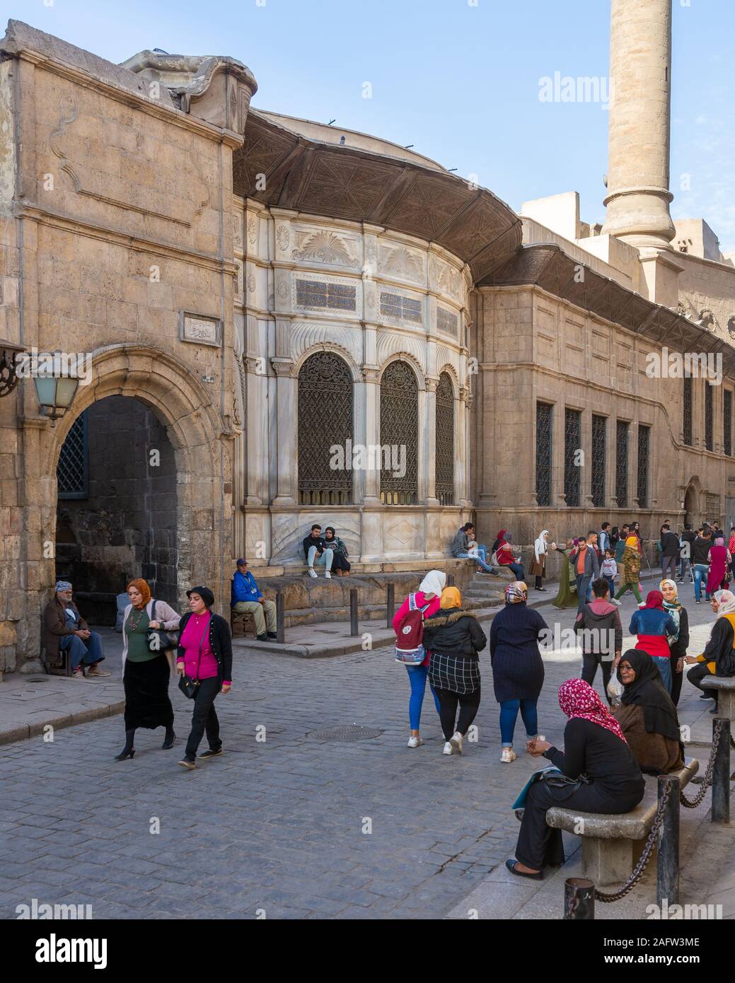 Cairo, Egypt- December 14 2019: Moez Street with facade of Ottoman era historic Soliman Agha El Silahdar complex building, Old Cairo Stock Photo