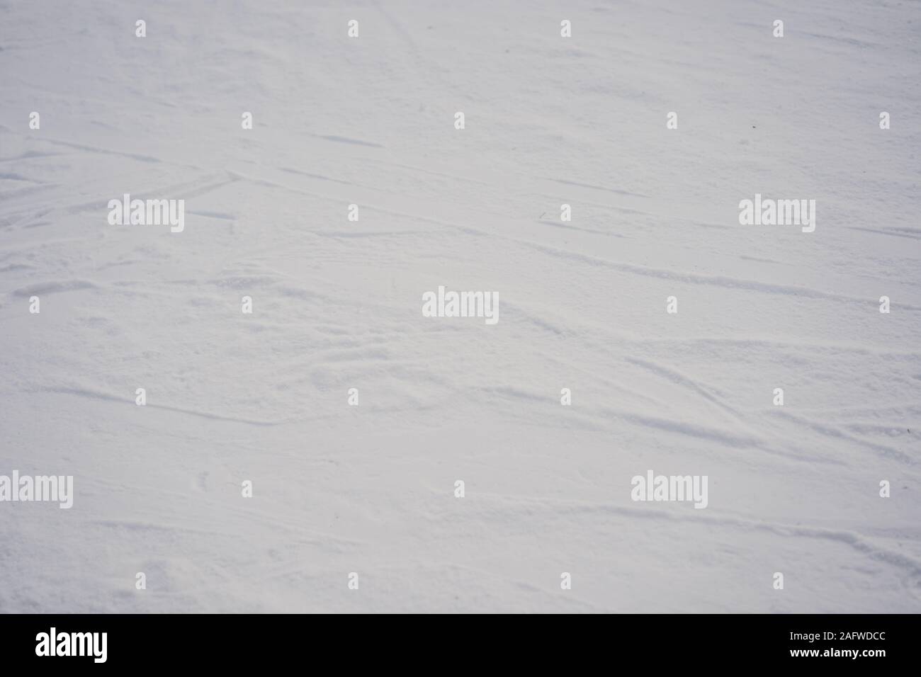 Snow rolled by skiers on a ski run Stock Photo