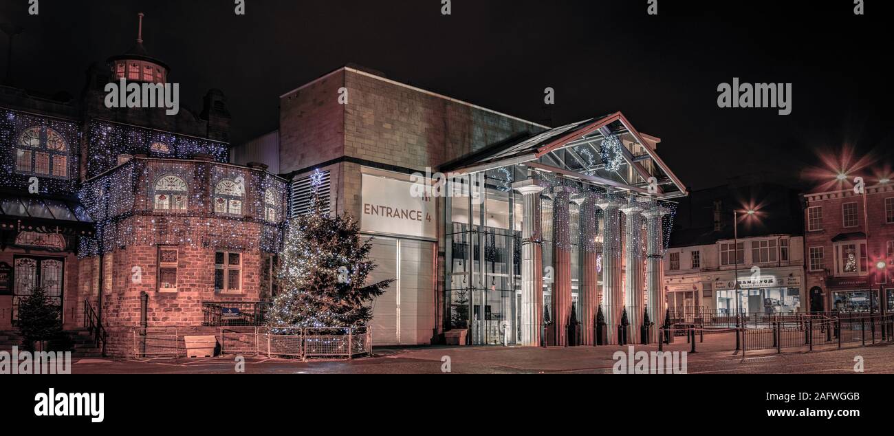 A Nighttime view of the Harrogate Convention Centre, Exhibition Halls, North Yorkshire, UK. November 2019. Credit: Caught Light Photography/Alamy. Stock Photo