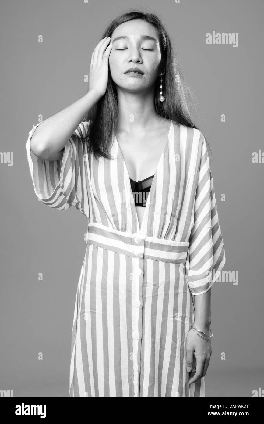 Portrait of young beautiful Asian woman in black and white Stock Photo ...