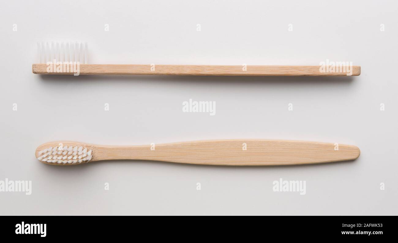 Eco natural bamboo toothbrushes on white background Stock Photo - Alamy