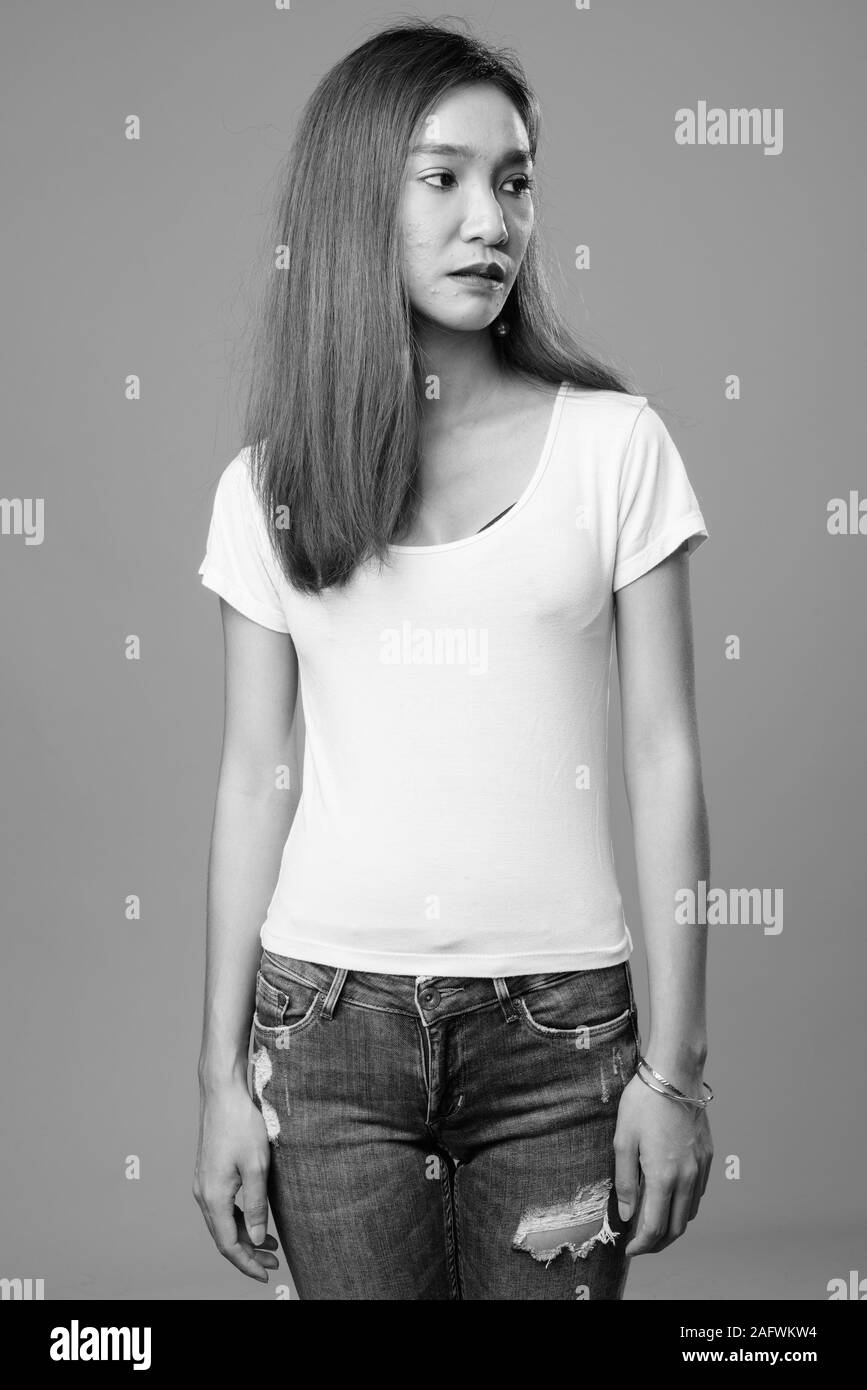Portrait of young beautiful Asian woman in black and white Stock Photo ...