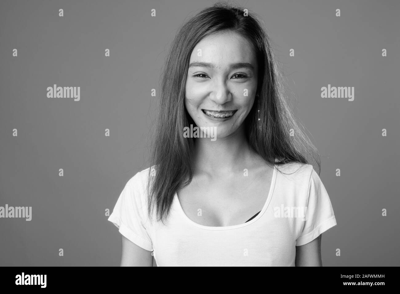 Portrait of young beautiful Asian woman in black and white Stock Photo ...
