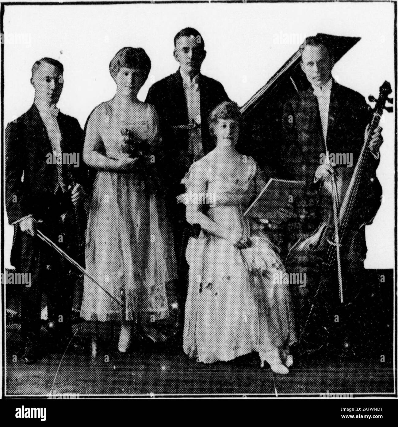 . Highland Echo 1915-1925. for the next threeyears. Affirmatve. Lee Moore, Nath-an Hayworth, Finley McBride, Don-ald Buchanan, Jean McMurray;I Negative, Joe Sixsmith, CarlislePatrick, Cosmos Winters, MuretteDeLozier, James Brown. Resolved: That a compulsoryschool law should be passed in eachstate requiring compulsory schoolattendance of boys and girls undertwenty-one years of age until theyhave completed a high school course.Affirmative, Julius Huffman, WalterBuchanan; Negative, Warner Gray,Nello Austin. Resolved: That before reachingIhe age of twenty-two, every malecitizen of the United State Stock Photo