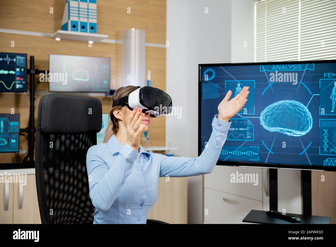 Clinical neurology worker explores virtual reality in the lab