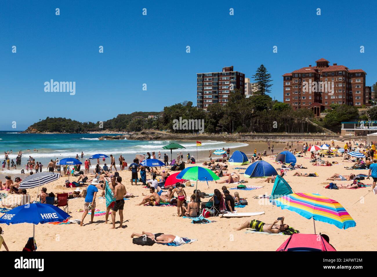 People sunbathing on Manly beach, Sydney, Australia Stock Photo
