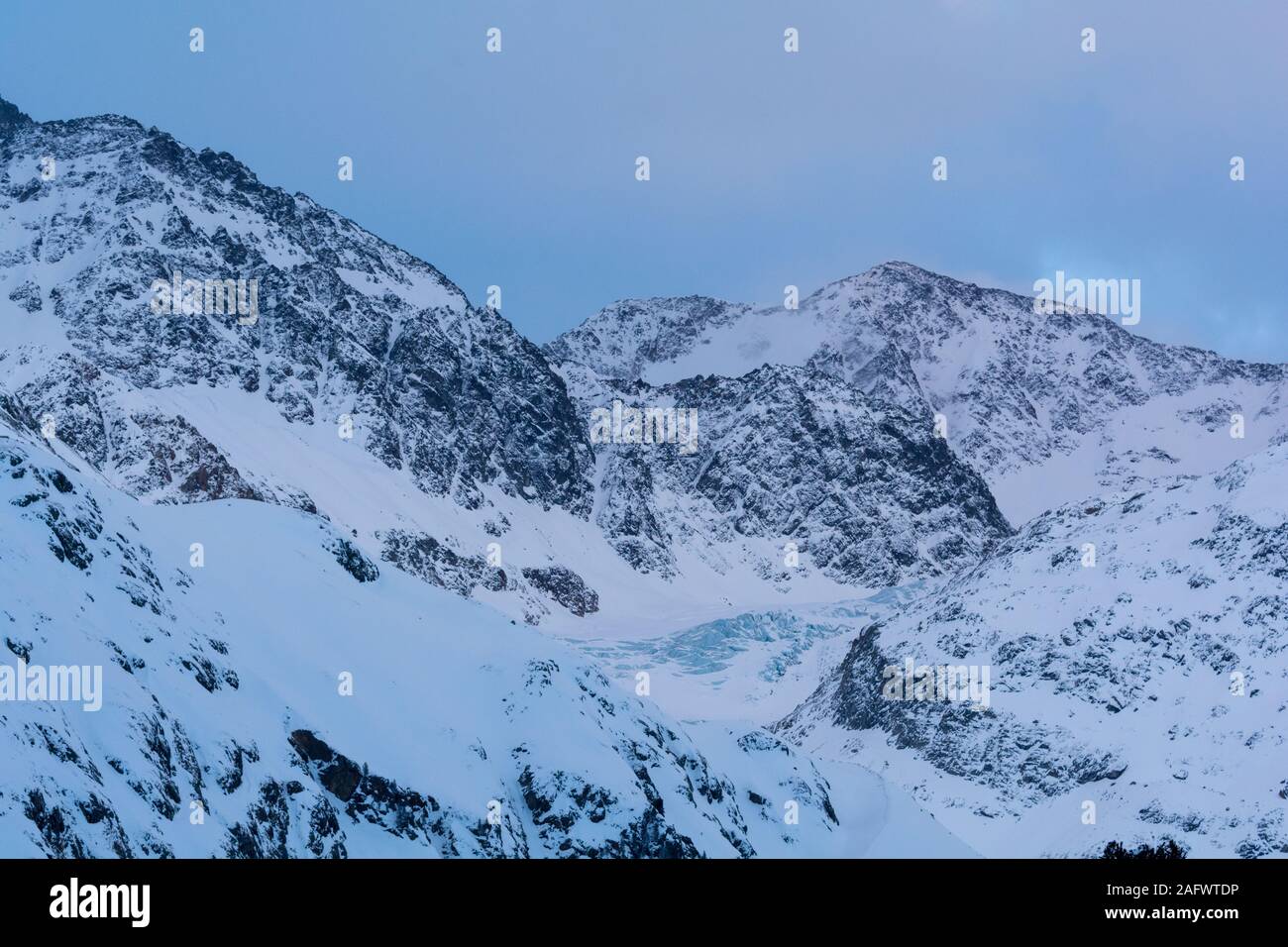 View over the Kaunertal glacier, with its beautiful turquoise color. Landscape in Kaunertal, Tyrol, in the Austrian Alps. After Sunset. Stock Photo