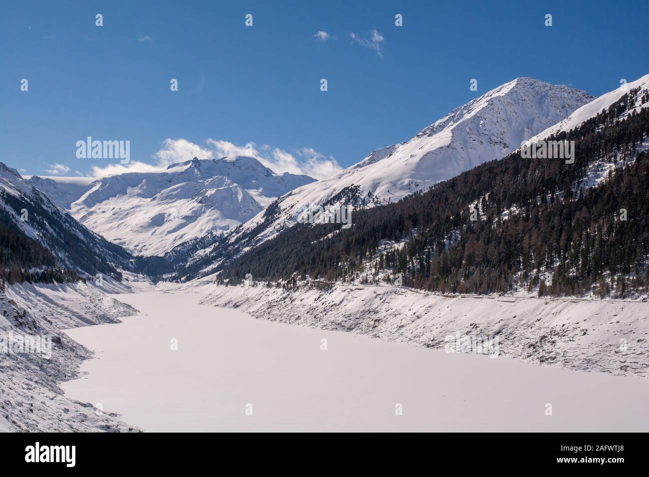 Beautiful view over mountain lake and mountains. View over the Kaunertaler lake and valley in Kaunertal,Tyrol, Austria. Stock Photo