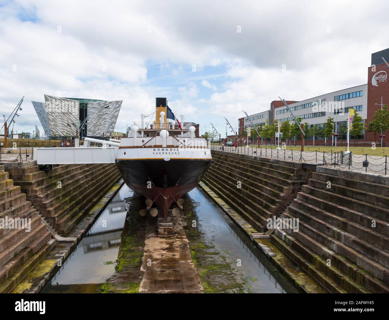 Titanic Belfast visitor centre and SS Nomadic boat in dry dock, Northern Ireland Stock Photo