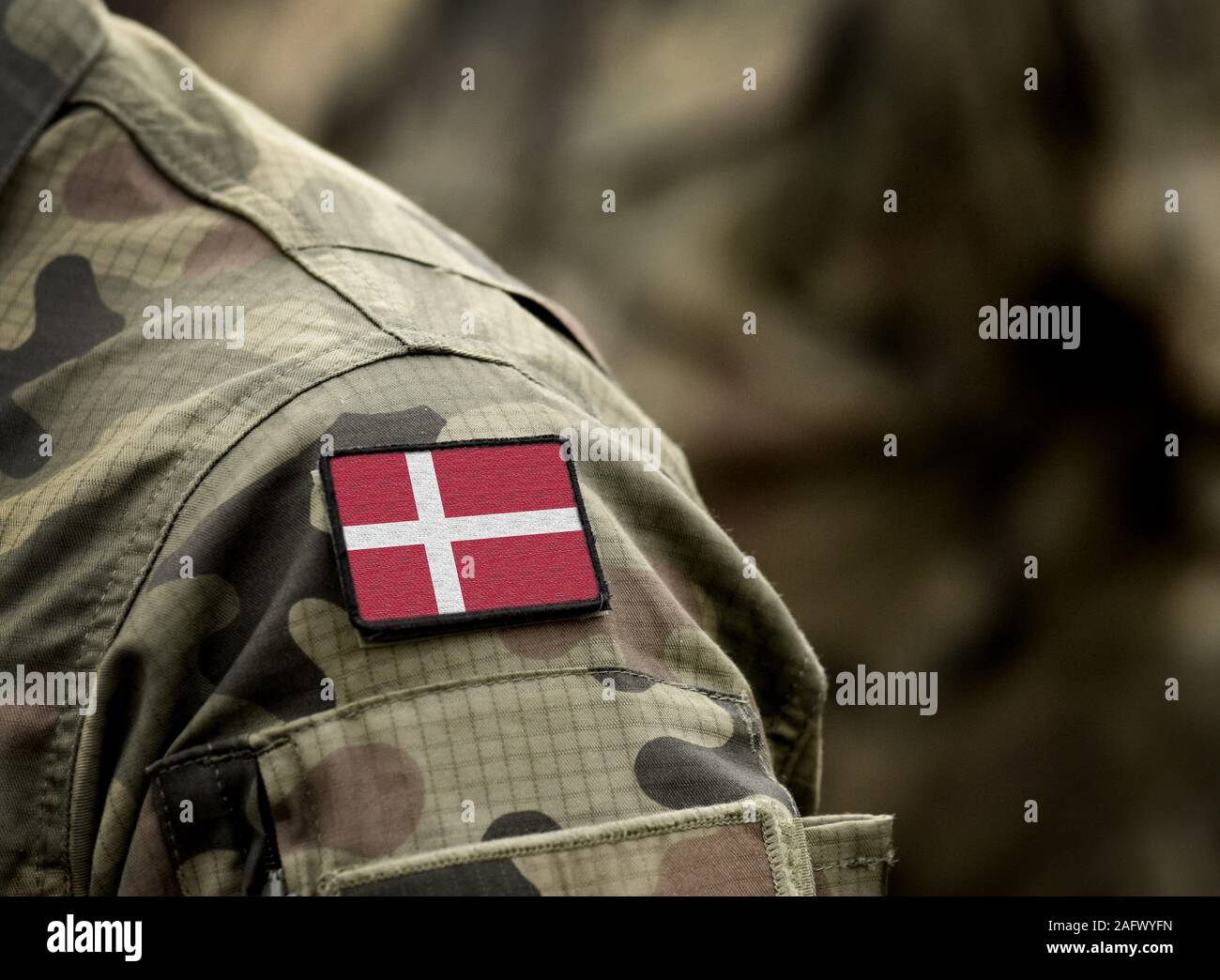 Flag of Denmark on military uniform. Army, armed forces, soldiers. Collage. Stock Photo