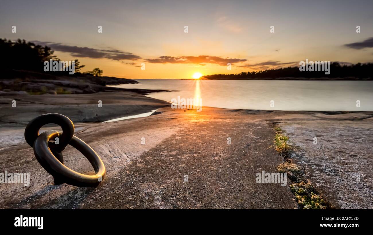 Sunset seen from Kutuhället island, Sipoo, Finland Stock Photo