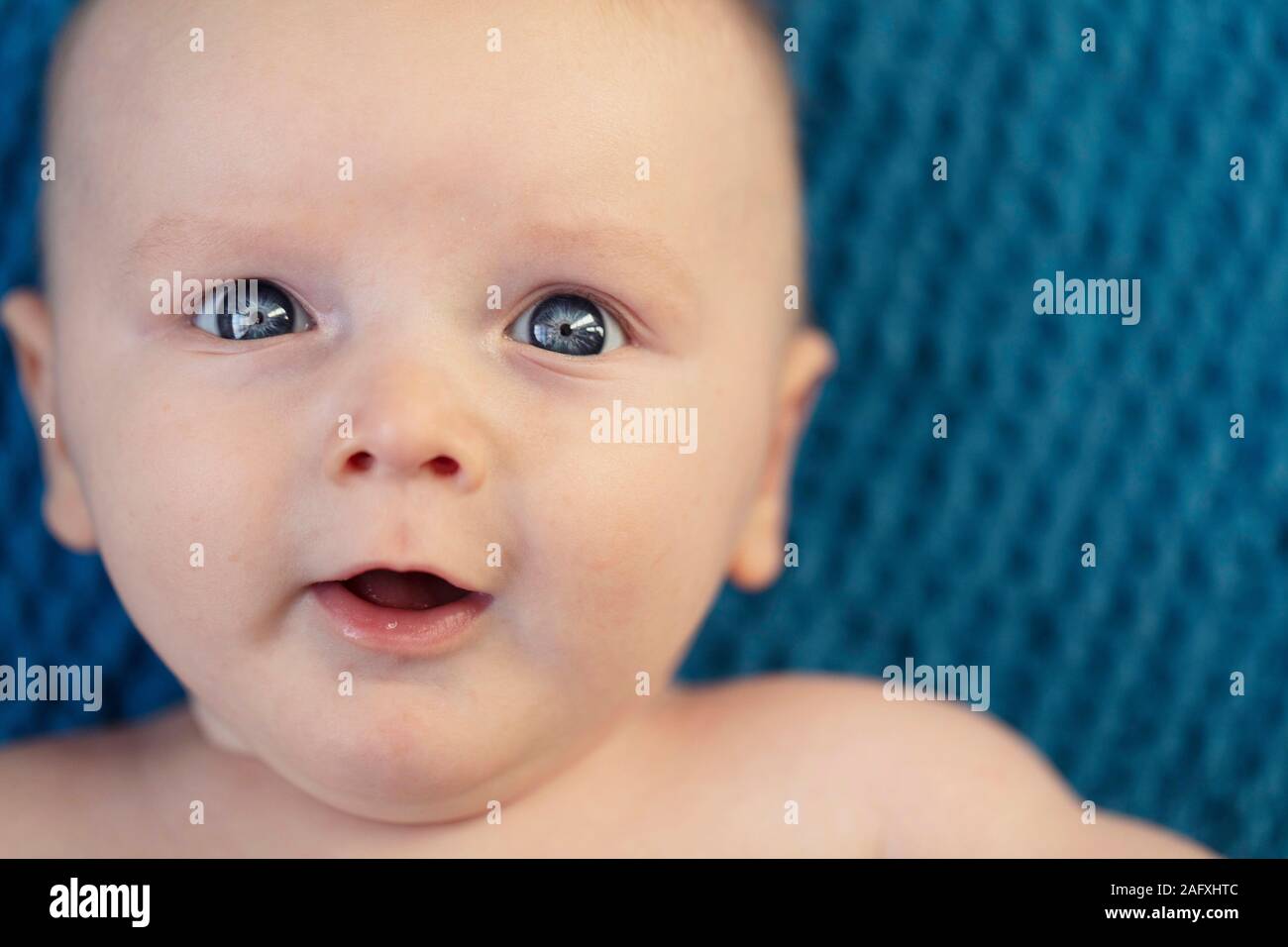 Cheerful bright blue eyes hi-res stock photography and images - Alamy