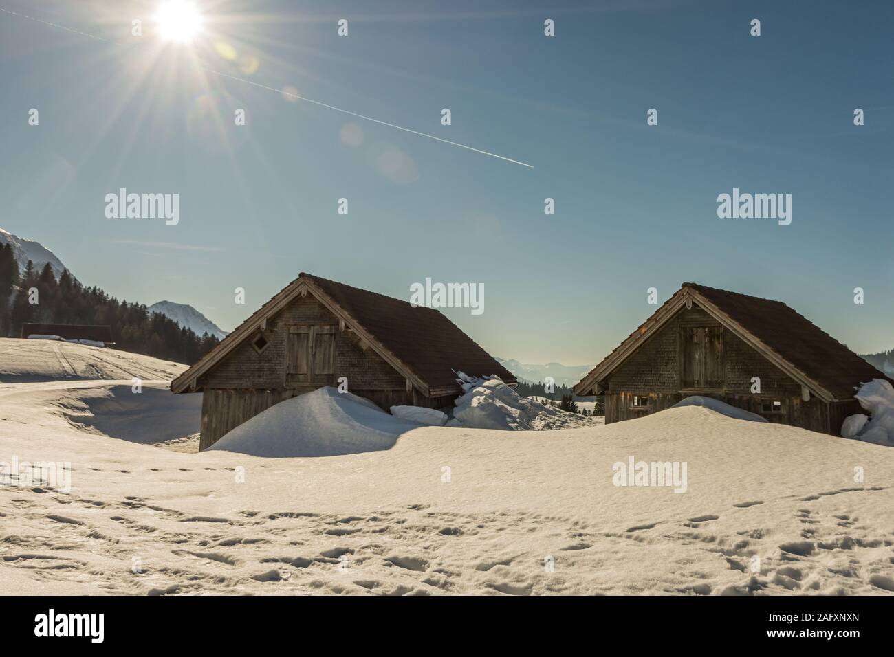 Winter landscape with wooden huts, Schwaegalp, Canton of Appenzell Ausserrhoden, Switzerland Stock Photo