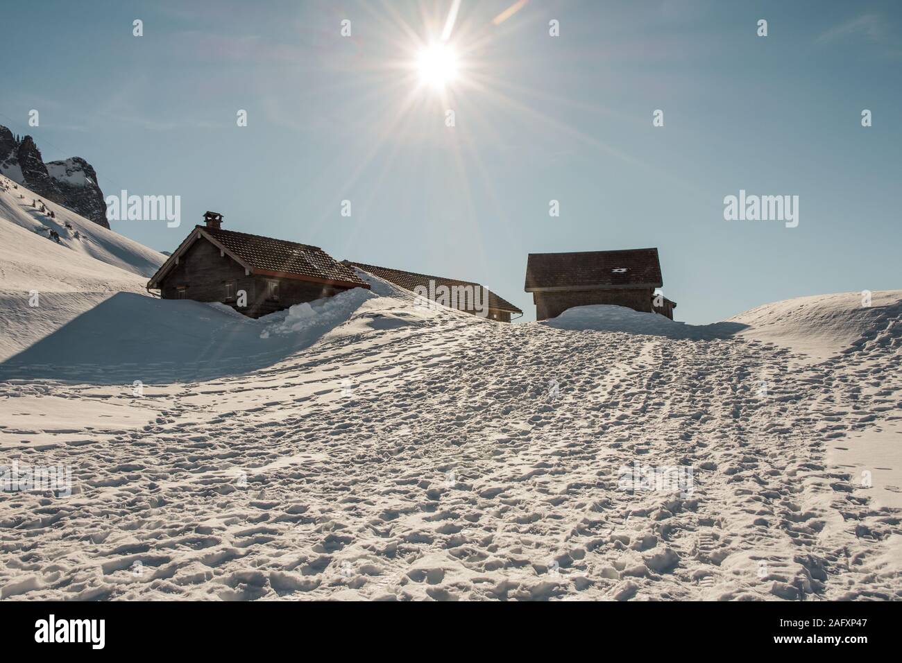 Winter landscape with wooden huts, Schwaegalp, Canton of Appenzell Ausserrhoden, Switzerland Stock Photo