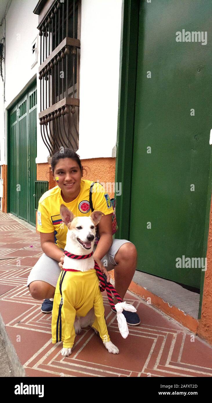 Female colombian football fan with dog both in colours hires stock photography and images Alamy