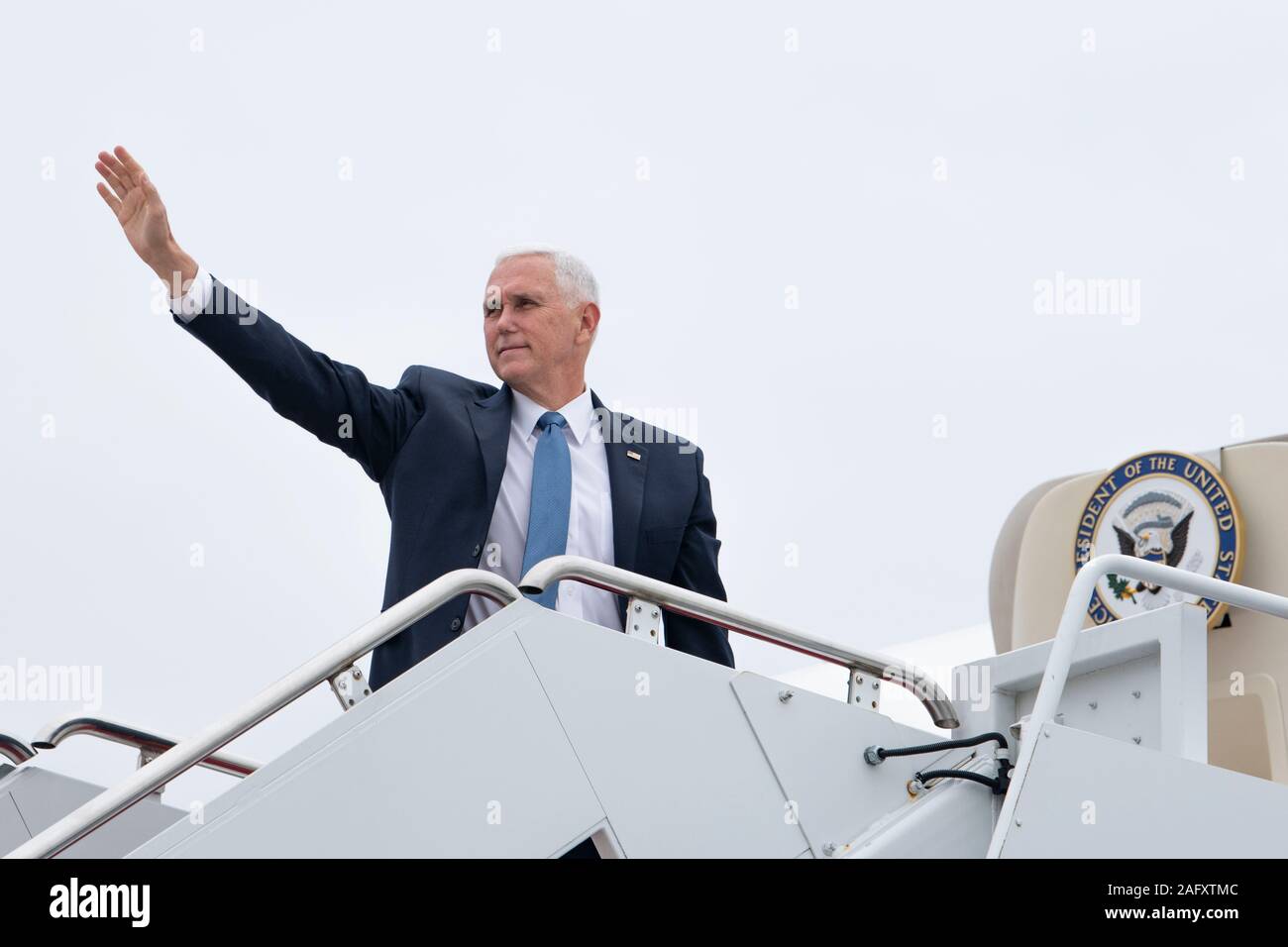 Vice President Mike Pence waves before boarding Air Force Two at Joint Base Andrews, Md., Nov. 20, 2019.  Pence traveled aboard a Boeing C-32 flown by pilots from the 89th Airlift Wing to visit Fincantieri Marinette Marine in Wisconsin. The 89th Airlift Wing ensures safe, reliable and comfortable airlift support for the President and Vice President of the United States, cabinet members and other senior officials to include Congressional Delegations, Supreme Court Justices and Ambassadors, as well as senior officers within the DoD. (U.S. Air Force Photo/ Tech. Sgt. Robert Cloys) Stock Photo