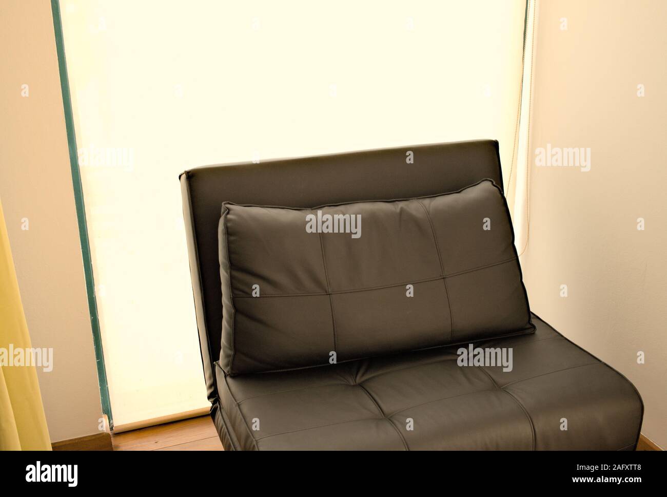 Interior design black leather sofa in a modern house (Madeira