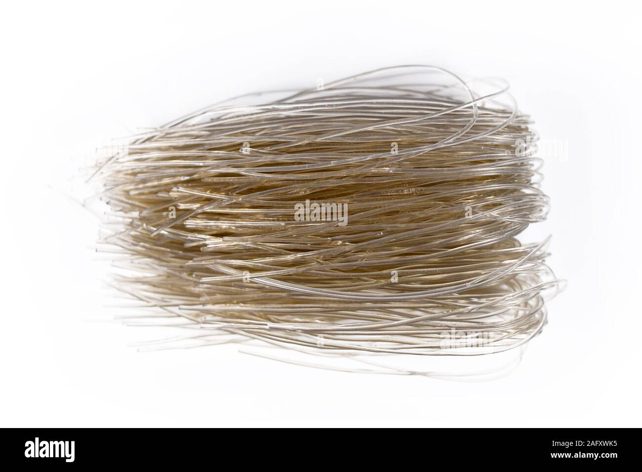 Dried low glycemic asian sweet potato glass noodles isolated on white
