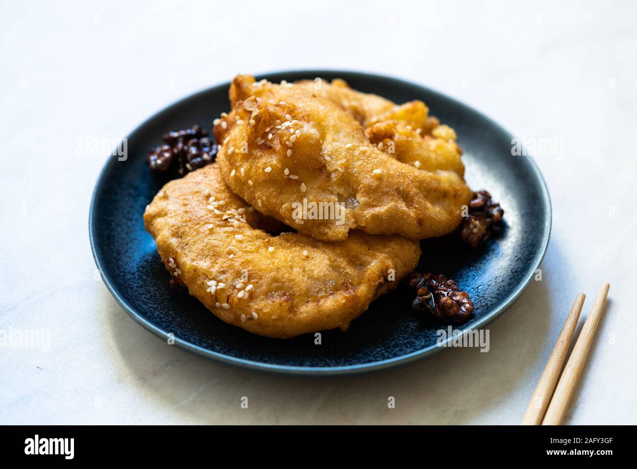 Fried Pineapple Fritters Caramelized With Cinnamon And Sesame Seeds Traditional Dessert Stock Photo Alamy