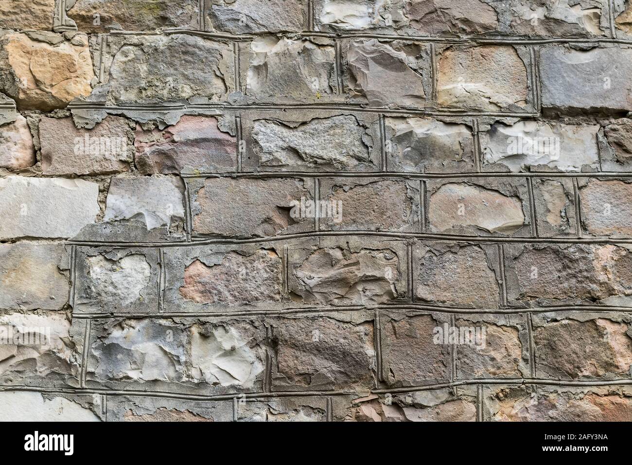Background of ancient stone wall. Texture of old brick Stock Photo - Alamy