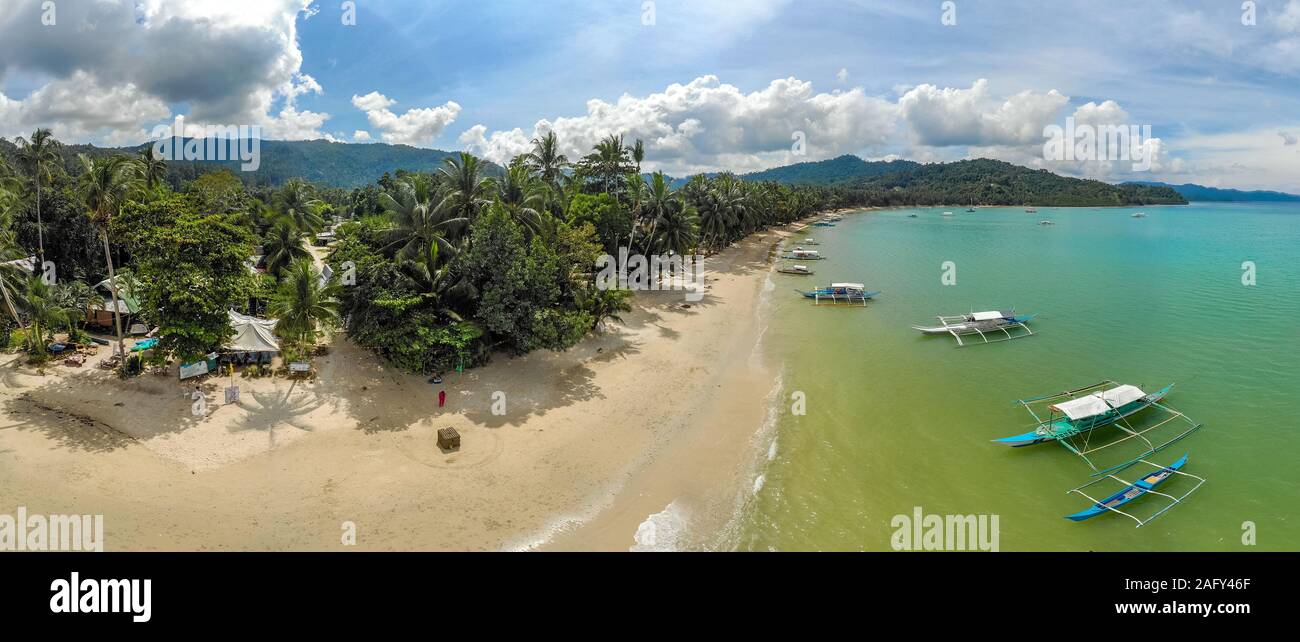 Aerial view of Port Barton Beach on paradise island, tropical travel destination Port Barton Aerial view of Port Barton Beach on paradise island, tropical travel destination Port Barton