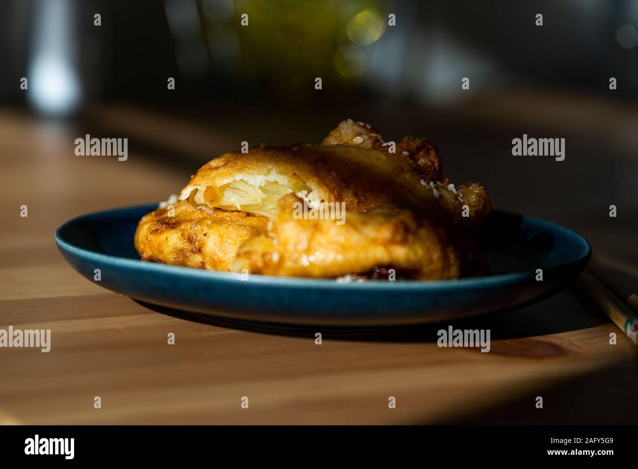 Fried Pineapple Fritters Caramelized With Cinnamon And Sesame Seeds Traditional Dessert Stock Photo Alamy