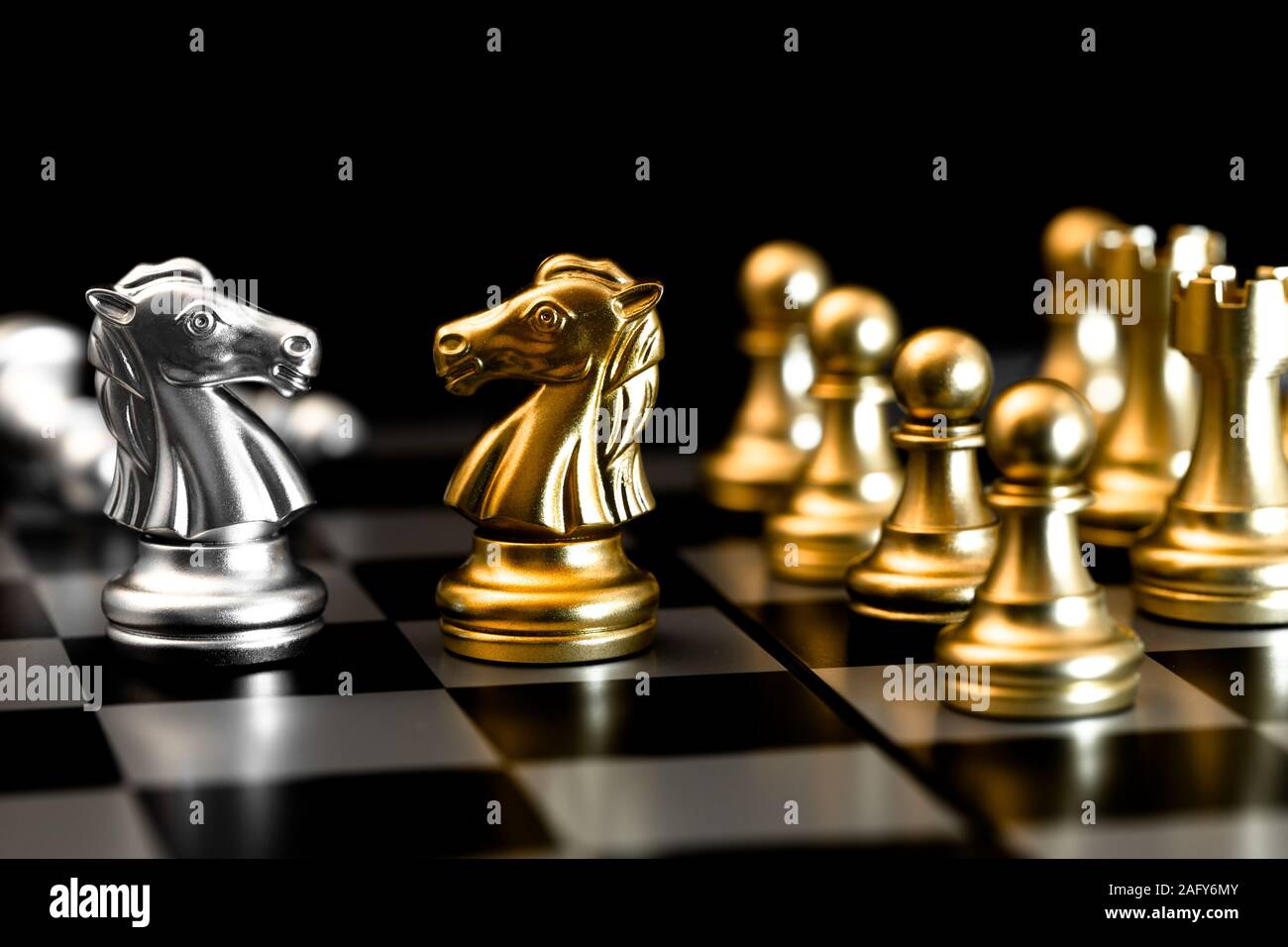 Chess piece represent business confront with competitor, Negotiations encounter people in market trade concept. Stock Photo