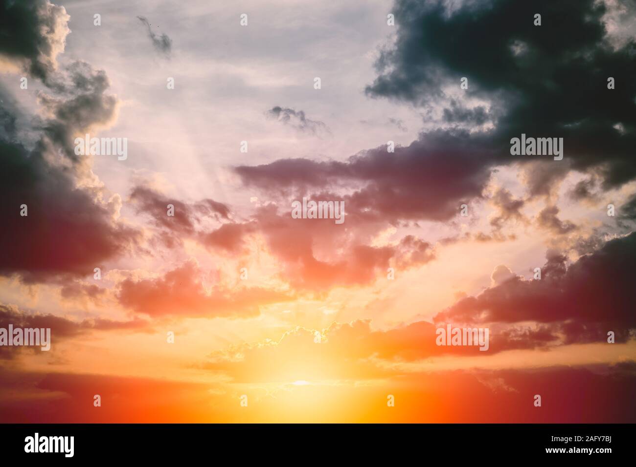 dark cloud sky with sunset dusk for light of hope after raining concept. Stock Photo