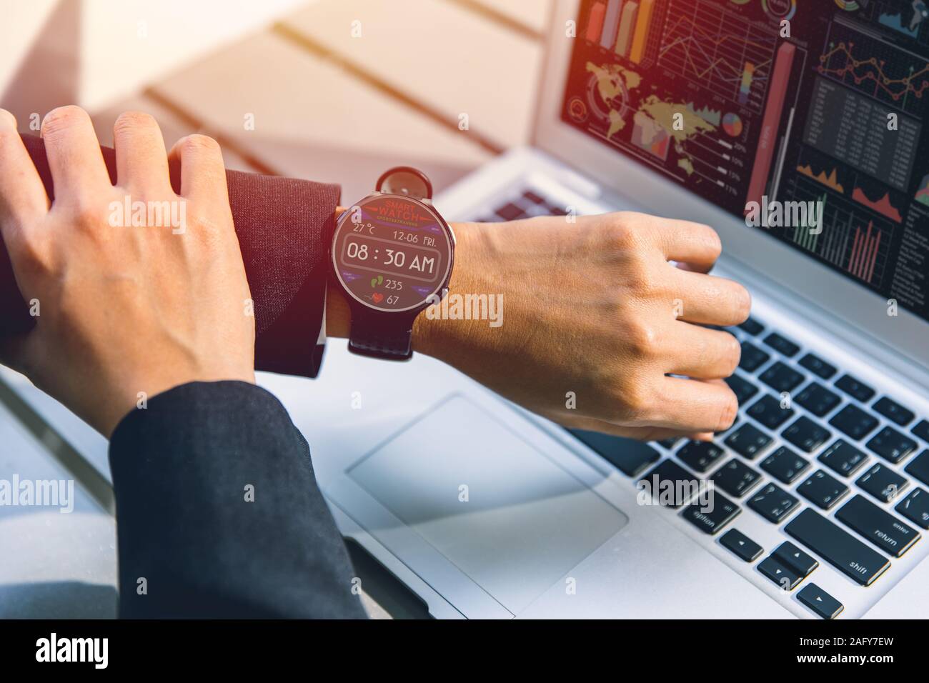 People looking at Smart Watch for healthy keep tracking step and heart rate everyday. Stock Photo