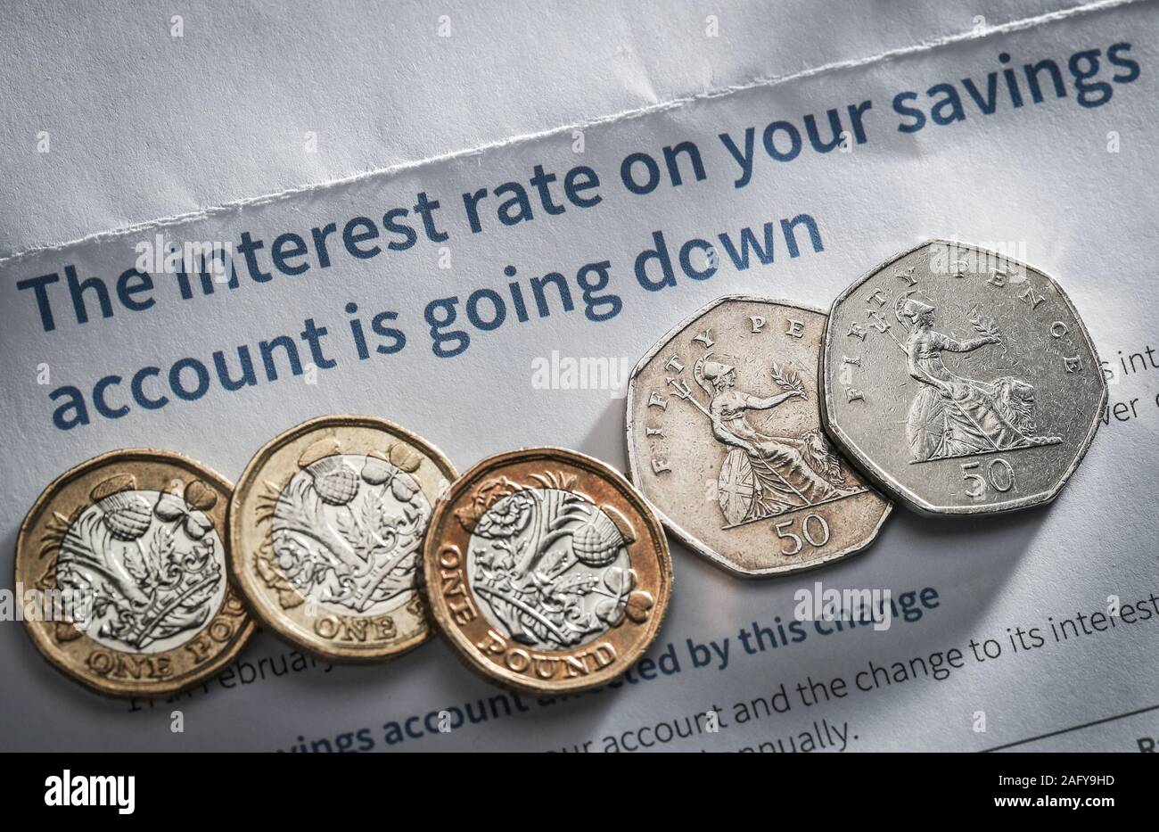 A Bank letter advising the customer the interest rates are going down on their savings account Stock Photo