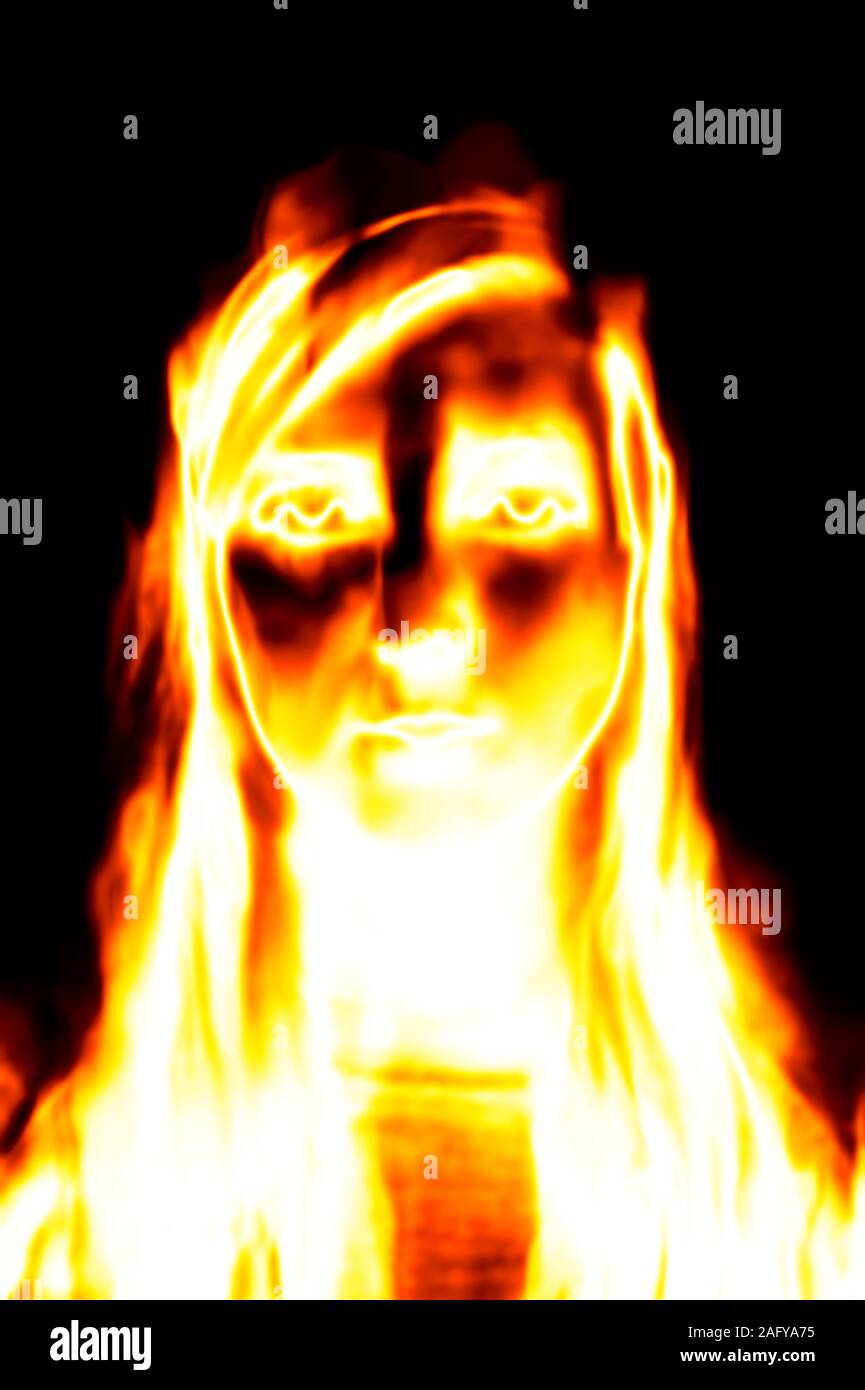 woman face on fire, horror effect Stock Photo