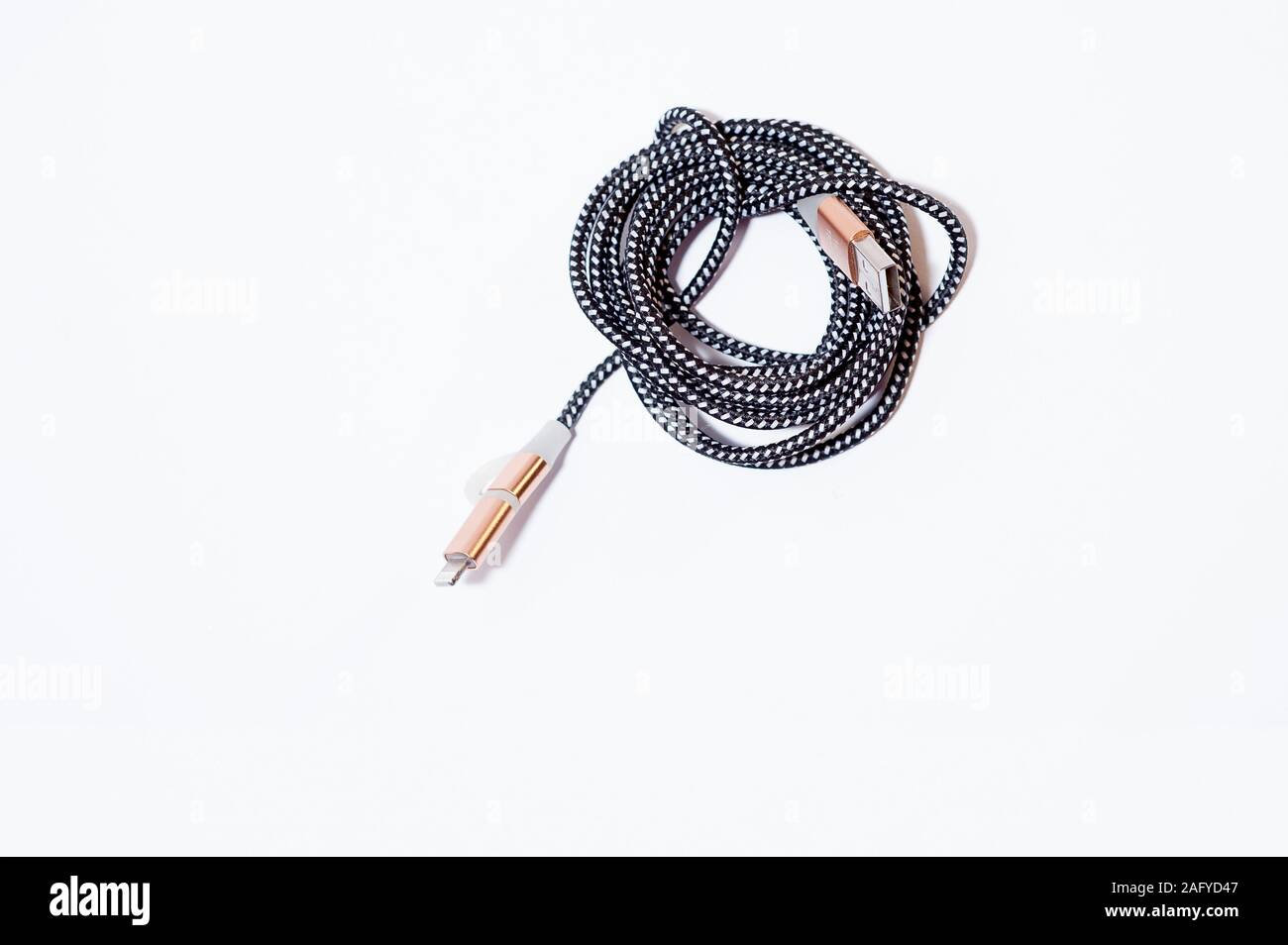 A charging cable on the white background Stock Photo
