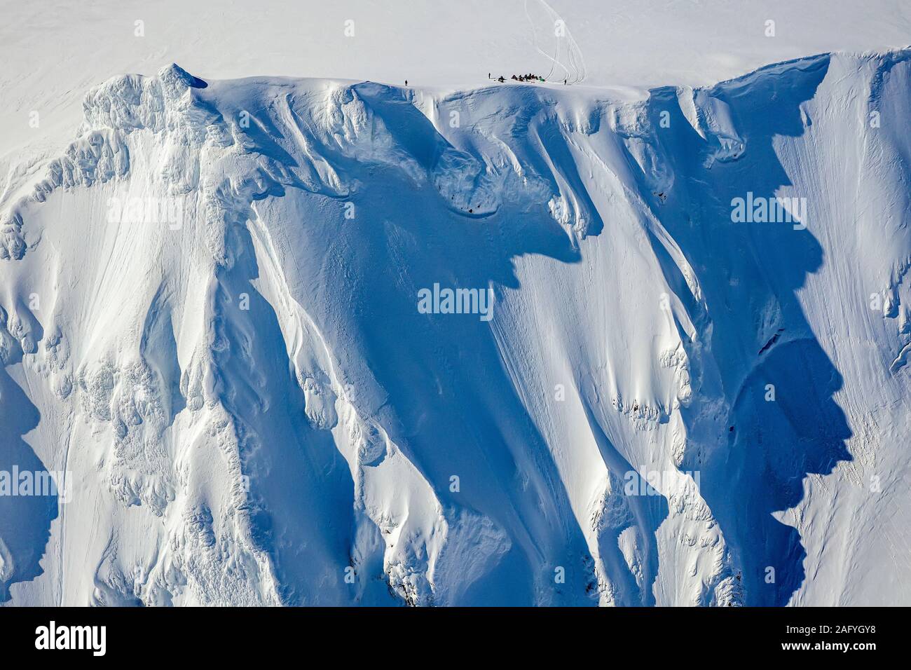 Tracks And Scientists Mt Hasteinar Cliffs Hofsjokull Glacier Iceland Stock Photo
