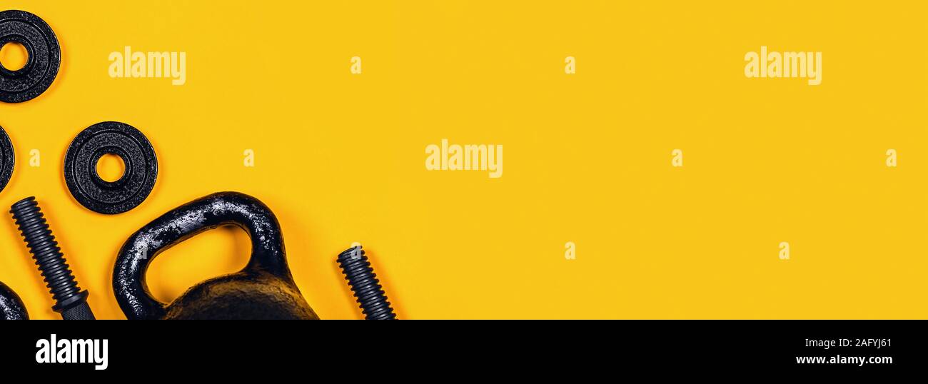Sports Web Banner Kettlebell And Dumbbell On Yellow Background