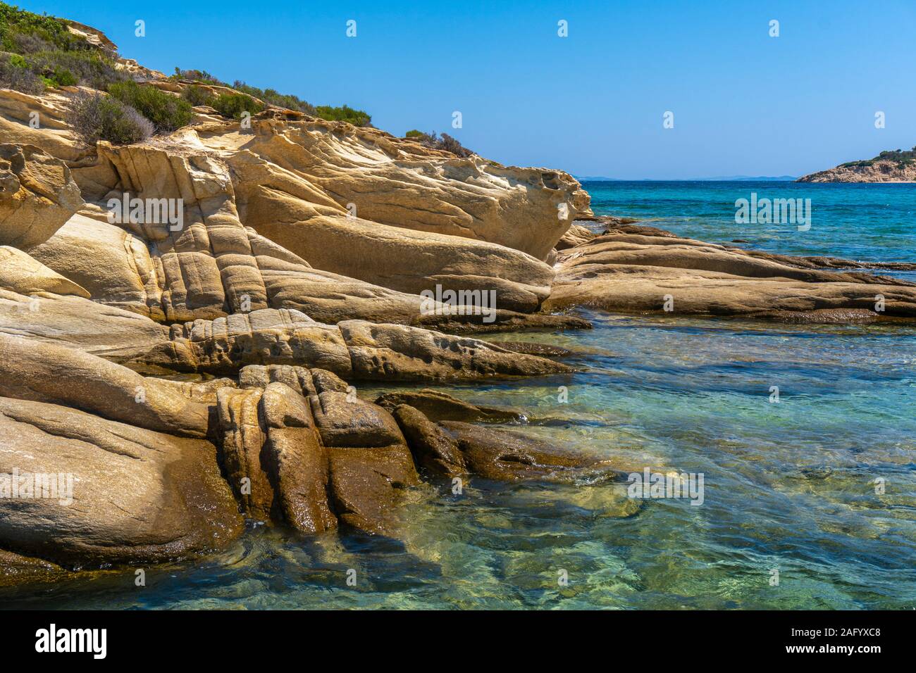 Mountain strata and sea in Greece horizontal Stock Photo - Alamy