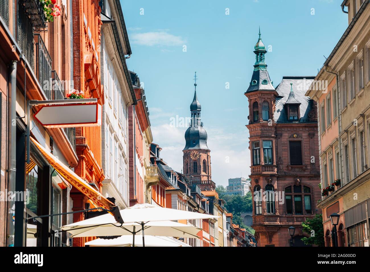 Old town Hauptstrasse main street and Heiliggeistkirche, Church of the Holy Spirit in Heidelberg, Germany Stock Photo