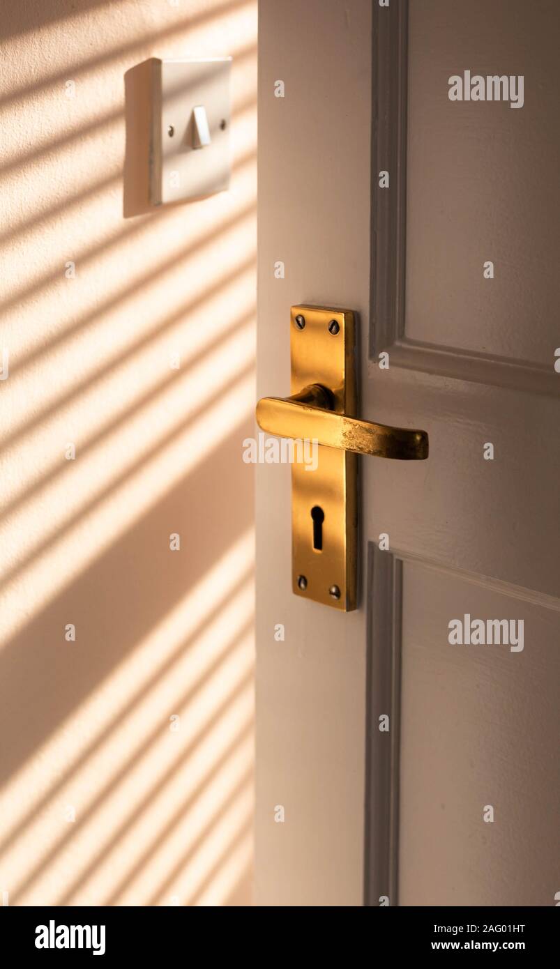 A old brass door handle. Stock Photo