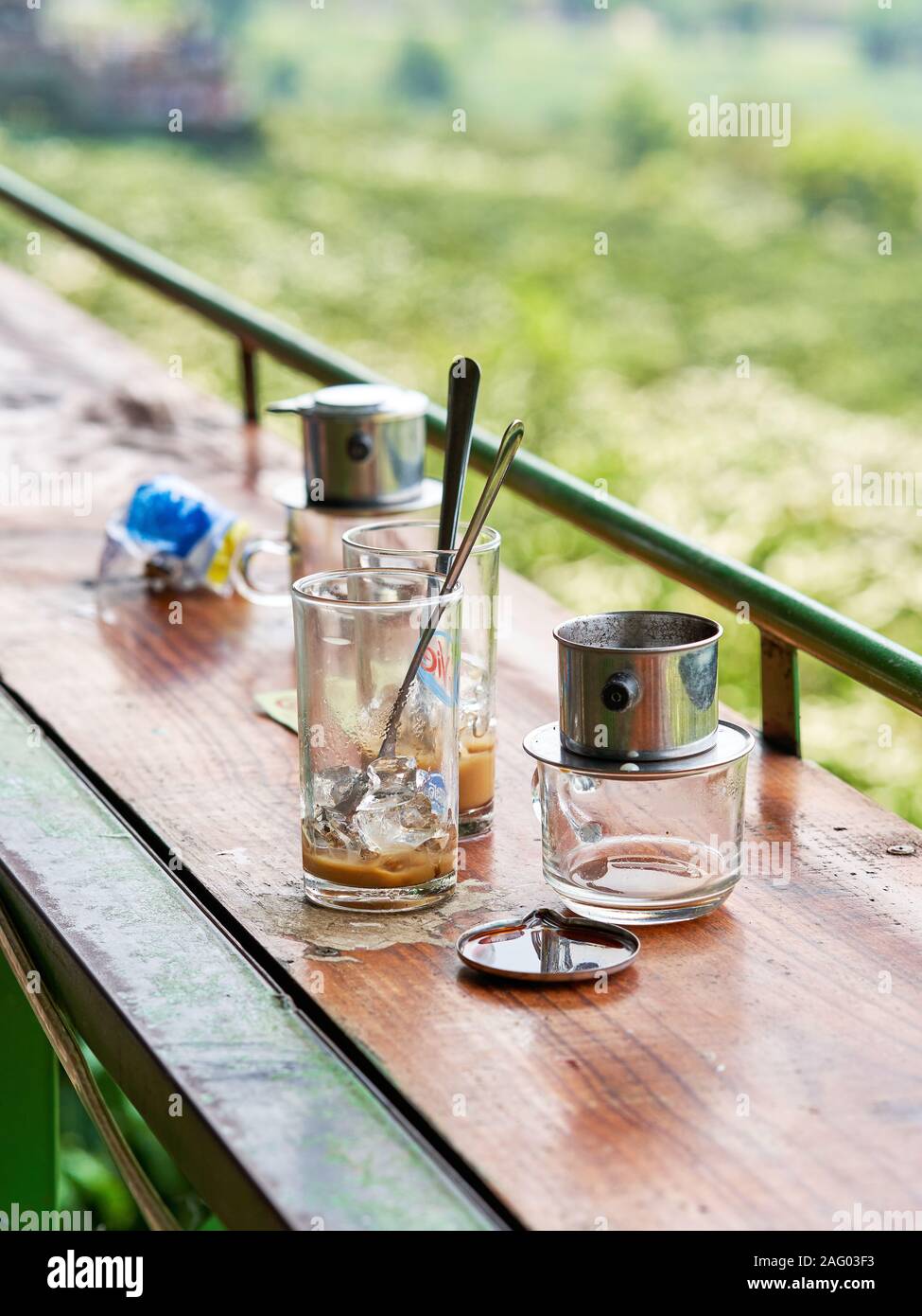 left over glasses of traditional Vietnamese coffee in Da Lat Stock Photo