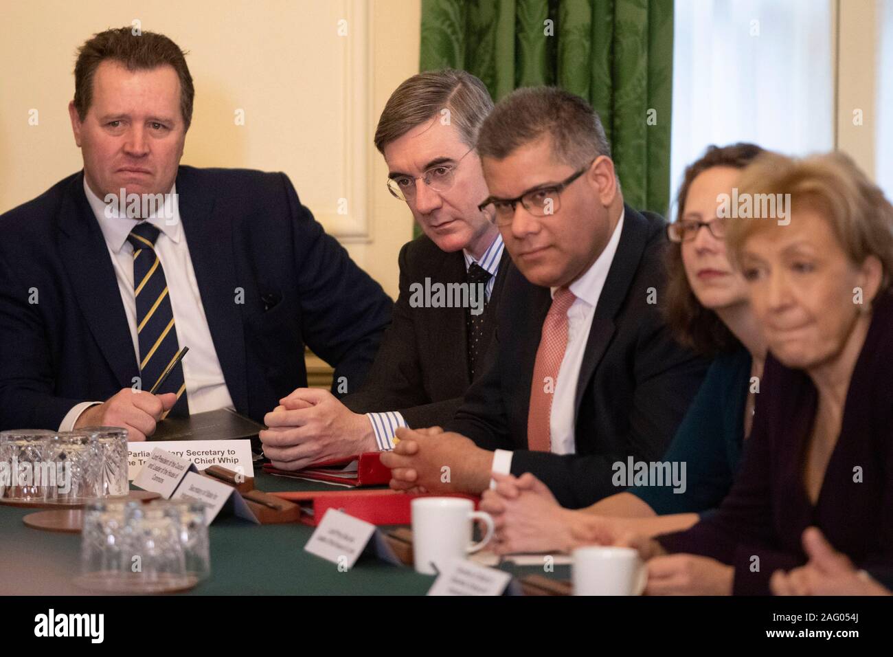 Leader the House of Commons Jacob Rees-Mogg and Chief Whip Mark Spencer listen as Prime Minister Boris Johnson holds his first Cabinet meeting following the General Election in Downing Street, London. PA Photo. Picture date: Tuesday December 17, 2019. See PA story POLITICS Tories. Photo credit should read: Matt Dunham/PA Wire Stock Photo