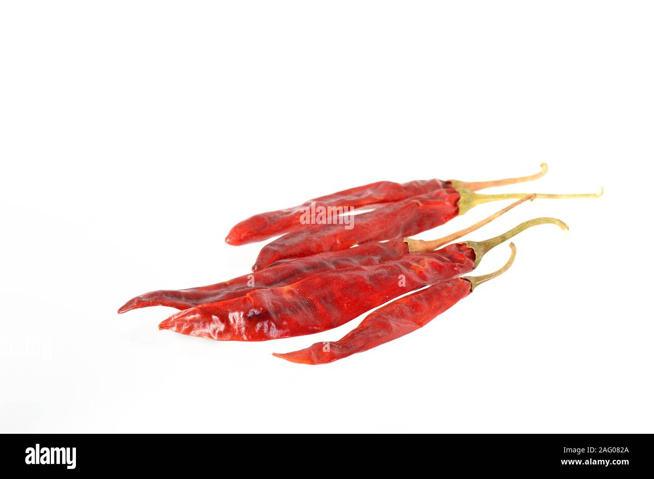 Red Chilli peppers isolated on white Stock Photo - Alamy