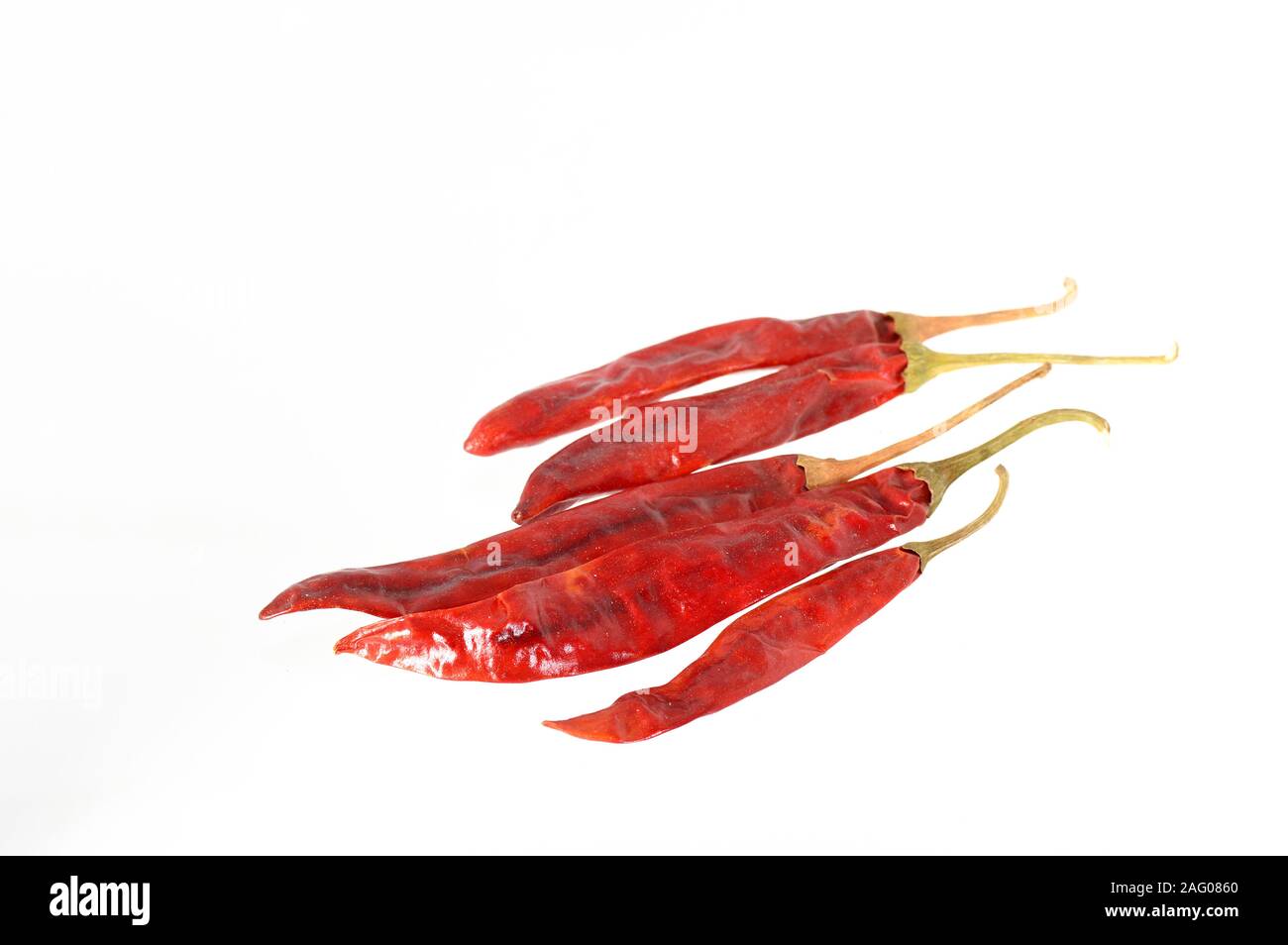 Red Chilli peppers isolated on white Stock Photo - Alamy